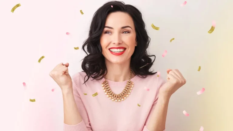 a woman celebrating her lottery win she manifested